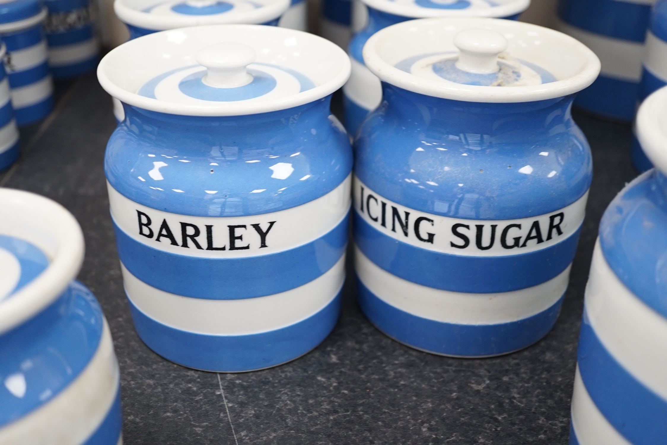 T.G Green Cornish Kitchenware, ten lidded storage jars to include Bath-Salts, Farola, Beans (2), and Cocoa-Nut, largest 14cm high, Green Church and Black Shield marks. Condition - fair to good